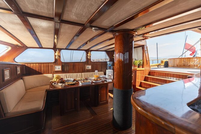 3 Island Cruise from Athens Unlimited Food Wine and Scenic Views - The Yacht Experience: Shade, Nibbles, and Real Meals