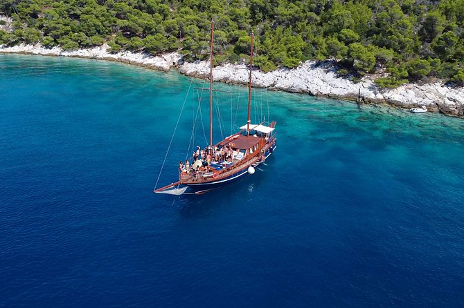 Athens Day Cruise: 3 Islands Tour in the Saronic Gulf with Lunch - Stop 1 on Agistri: beaches, Megalochori streets, and what fits in 90 minutes