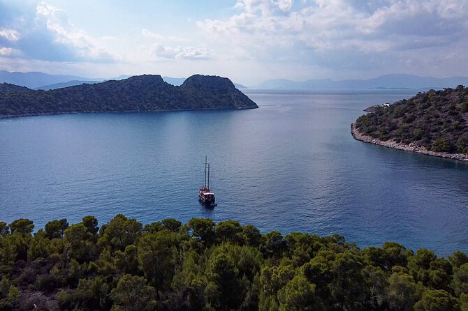 Athens Day Cruise: 3 Islands Tour in the Saronic Gulf with Lunch - Stop 3: Aegina—Kolona’s Apollo column and pistachio time