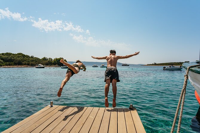 Blue Lagoon & 3 Islands Small-Group Speedboat Tour - Blue Lagoon and Krknjasi Bay: Swim, Snorkel, and Plan Around the Shore