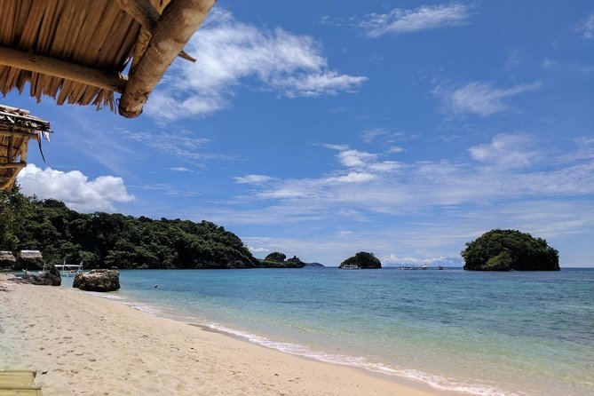 Boracay Island Hopping + Hot Kawa + Parasailing + Helmet Diving - Ilig Iligan, Crocodile Island, and reef stops that change with the season