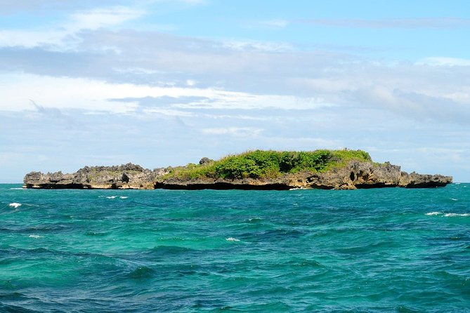 Boracay Island Hopping + Hot Kawa + Parasailing + Helmet Diving - Stop 1: Puka Shell Beach area, plus lunch and the hot kawa bath