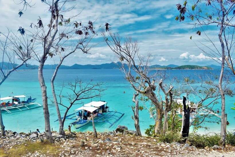 Coron: Coastal Cliffs, Beach & Malcapuya Island Hopping Tour - Stop 2: Malcapuya Island snorkeling with the best beach setting