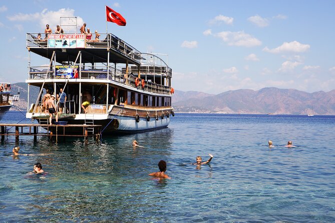 Dolphin Island Boat Trip – Swim, Sun & Lunch Included - Drinks, snacks, and the party-boat reality
