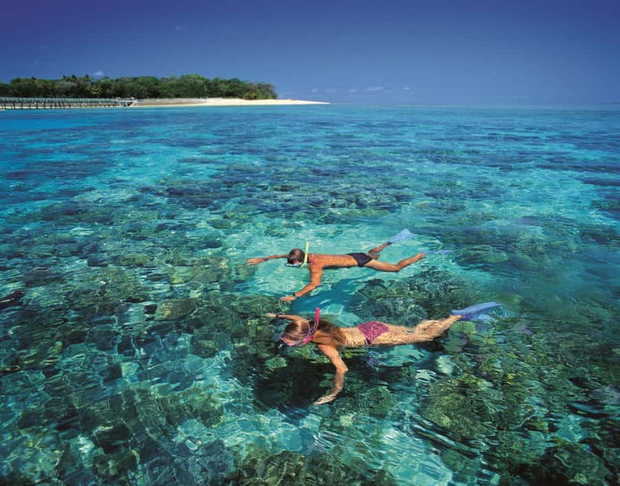 From Cairns: Full-Day Green Island Cruise - Getting to Green Island: Cairns in the Rearview Mirror