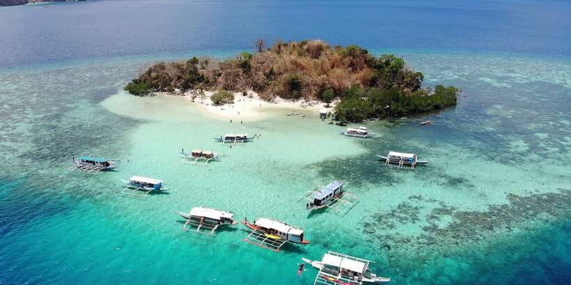 From Coron: Island Hopping Boat Day Trip with Buffet Lunch - Boat comfort, crew tone, and how the day flows