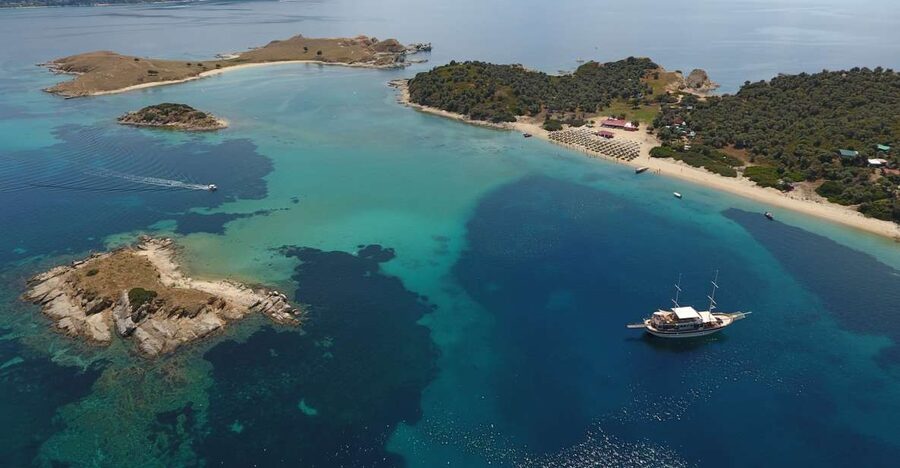 From Ouranoupoli: Blue Lagoon Two Island Cruise - Ammouliani Island Market and Village Stops That Add Texture
