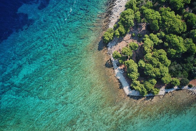 From Split: Half-Day Blue Lagoon and 3 Islands Boat Tour - Solta-Maslinica village: fishing traditions plus a short walk