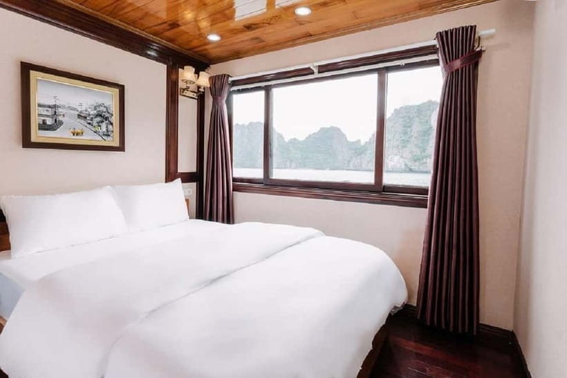 Hanoi or Ninh Binh: 2-Day Lan Ha Bay & Cat Ba Island Cruise - Day 1 on the Water: Pen Islet, Dark and Bright Cave, and Ba Trai Dao Beach