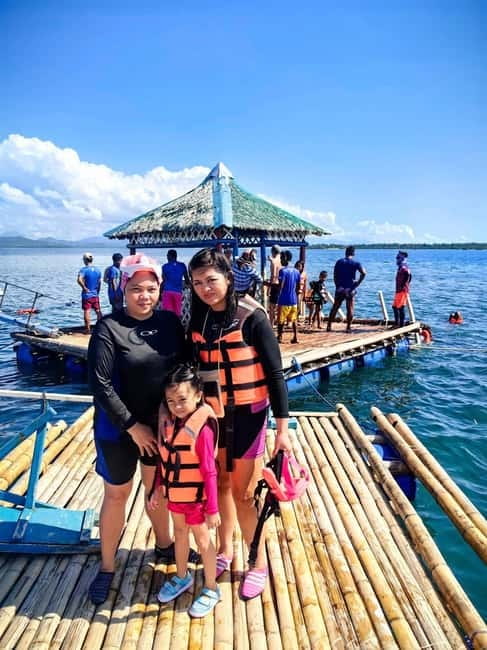 Honda Bay Island Hopping Tour – A Perfect Day in Paradise - Starfish Island: shallow water, wading, and coral spotting