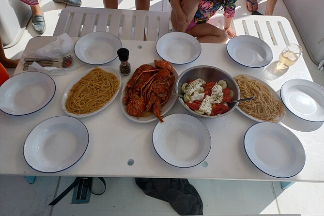 Naxos private fishing trips, lunch on board & island hopping - Catch of the day onboard: the real meal is the point