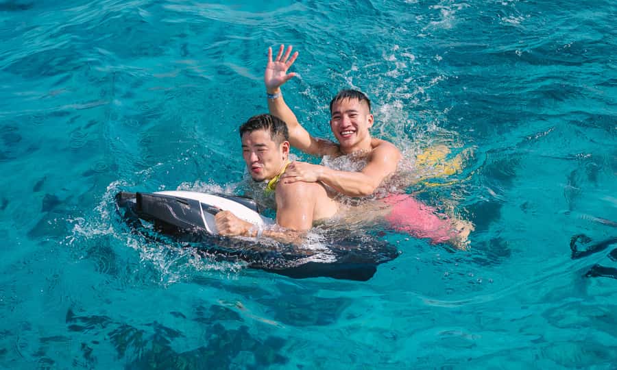 Phuket: Sailing Yacht Island Hopping & Party Full-Day Cruise - Racha Yai: the water play zone for snorkelers and paddleboard fans