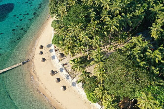 Port Barton Island Hopping - Seaplane Transfer FR Puerto Princesa - Stop 1: Maxima Island beach time and snorkeling-friendly water