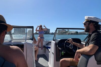 Private Boat: Island Cruise and Dolphins - The engine-off stretch: calmer water, feet in, and sunset watching