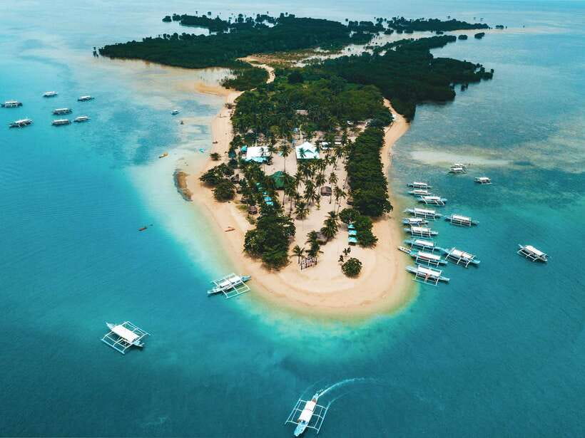 Puerto Princesa: Honda Bay Island Hopping & Optional Massage - Getting on the water: rentals, the boat ride, and what to expect
