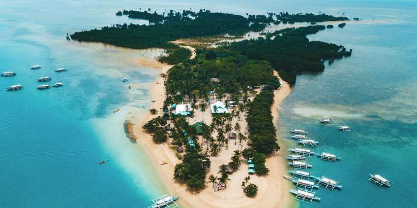 Puerto Princesa: Honda Bay Island Hopping & Optional Massage - Cowrie Island: the long beach break with lunch and optional massage