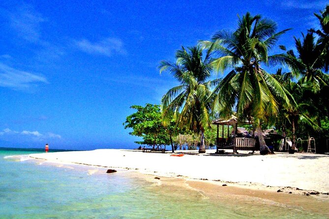 Puerto Princesa: Honda Bay Island Hopping with Buffet Lunch - Hotel pickup, a quick ride, and the wharf at 7 a.m.