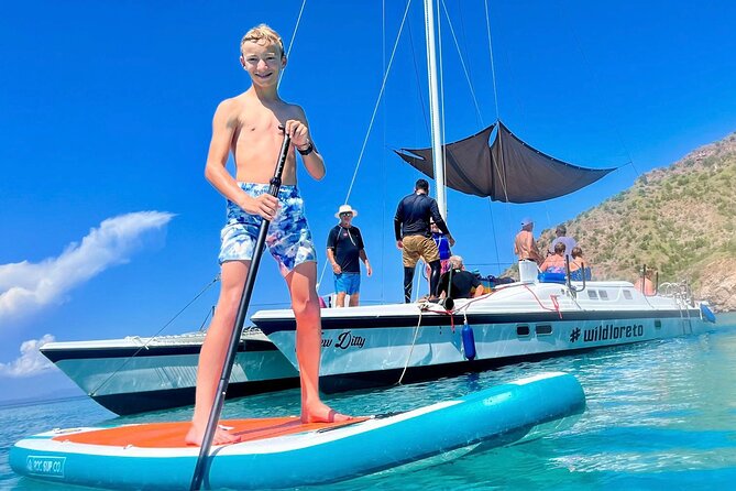 Snorkeling Catamaran Island Cruise - Stop 3: Lunch, music, open bar, and cruising back to Puerto Escondido