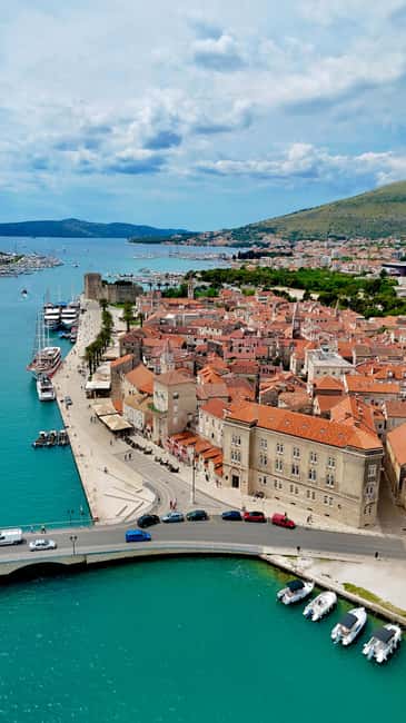 Split: Blue Lagoon & 3 Island Cruise with Snorkeling - UNESCO Trogir in about an hour: fortress views and cathedral details
