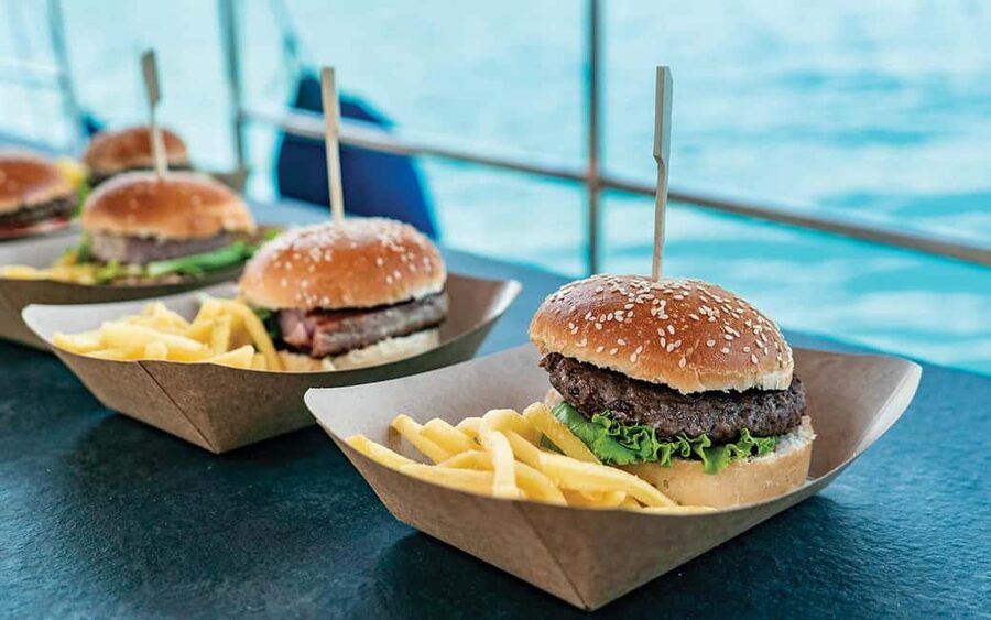 Split: Blue Lagoon and 3 Island Cruise with Food and Drinks - Breakfast donuts and unlimited drinks: what the onboard part really does for you