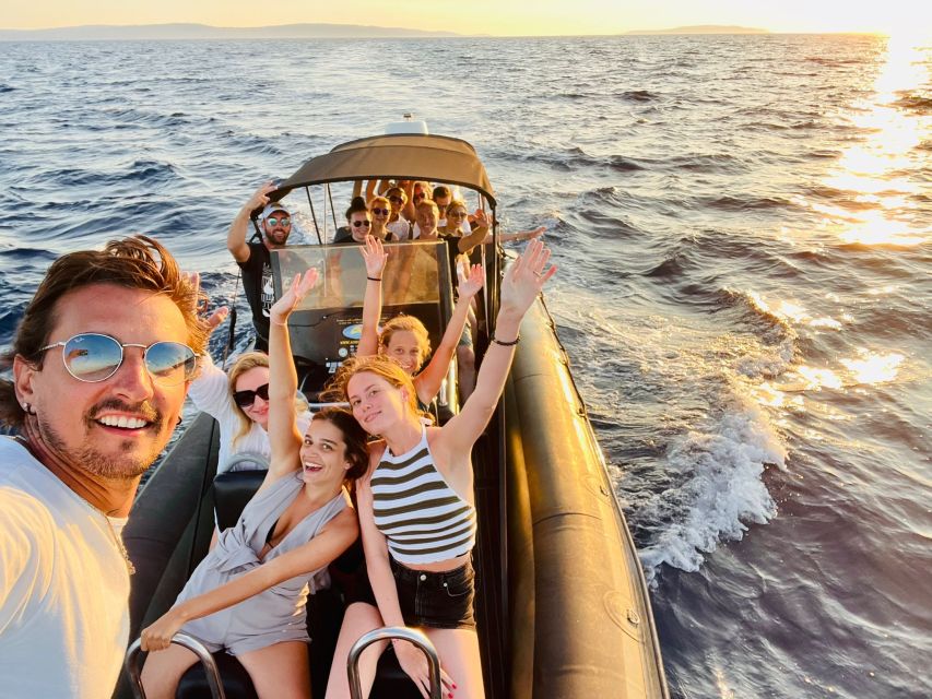 Split: Blue Lagoon and 3 Islands Group Boat Tour - Blue Lagoon: snorkeling gear, a beach bar, and that unreal water