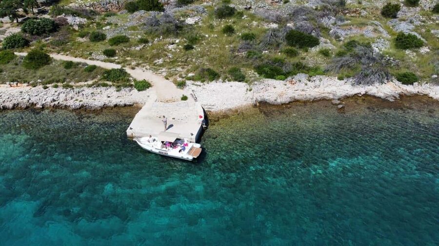 Zadar: 3 Islands Half-Day Boat Tour with Snorkeling & Fruit - Island Ugljan: the quiet olive island where the swim happens