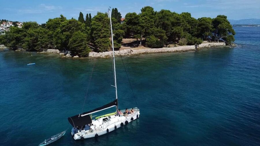 Zadar: Island cruise with drinks, snorkeling and kayaking - First swim and snorkel stop: island coves and clear-water time
