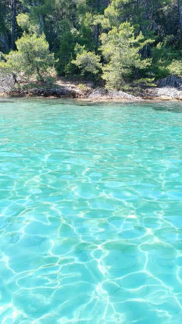 Zadar: Three Islands Private Boat Tour - Preko: the break stop that turns into food time